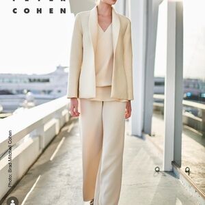 Chic Cream long Sleeve open back knotted Blouse by Designer Peter Cohen